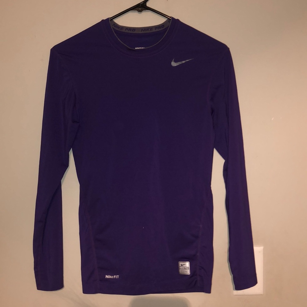 A purple Nike shirt